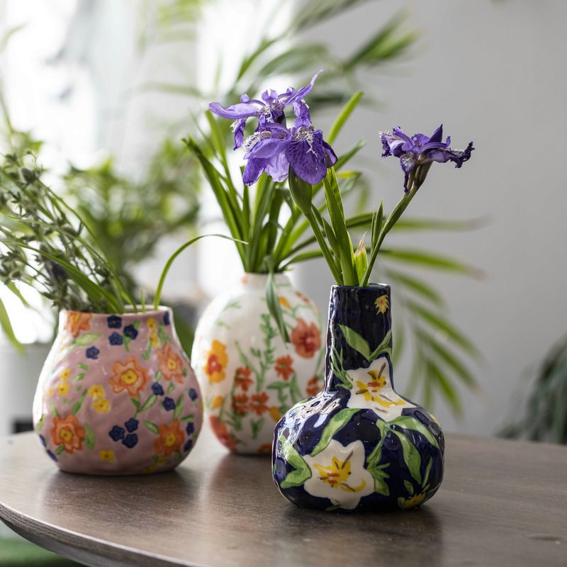Hand-painted floral vases in vibrant colors featuring purple iris flowers, part of our Vases and Decor collection
