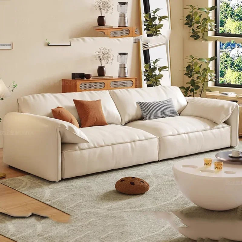 Crafted in genuine Nappa calf leather with a sleek ivory White finish for timeless elegance, a recliner that blends luxury materials with modern comfort WHIMSICAL HOME OF CREATIONS