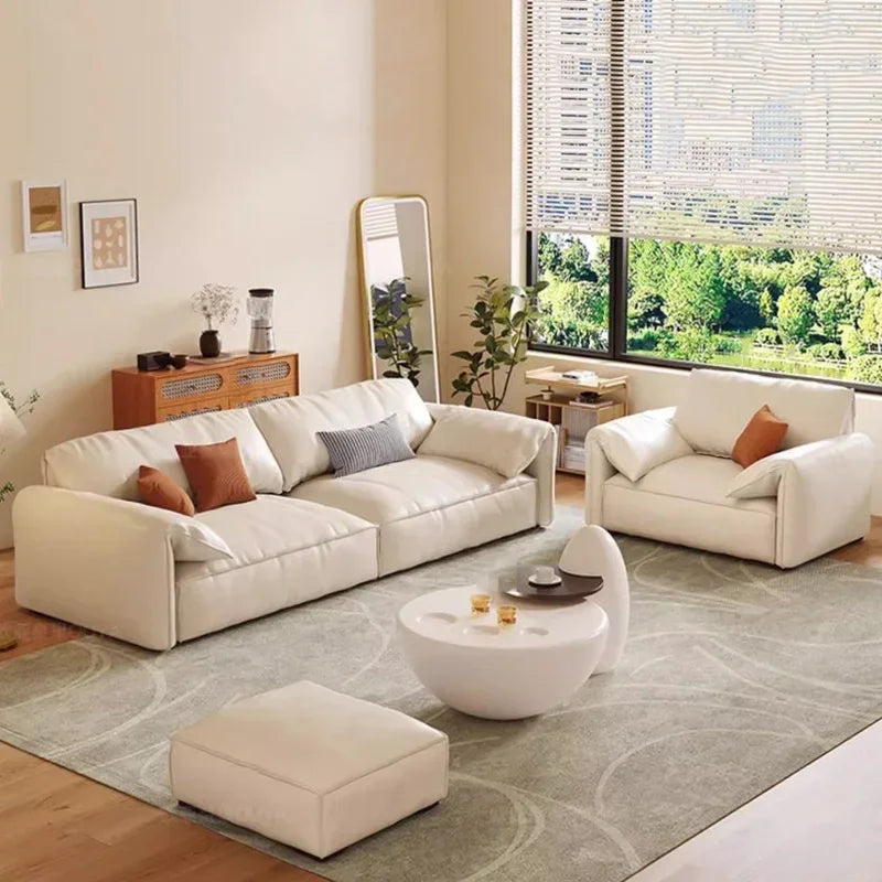 Crafted in genuine Nappa calf leather with a sleek ivory White finish for timeless elegance, a recliner that blends luxury materials with modern comfort WHIMSICAL HOME OF CREATIONS