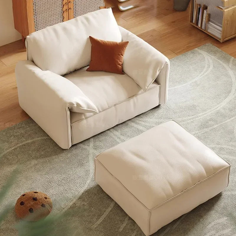 Crafted in genuine Nappa calf leather with a sleek ivory White finish for timeless elegance, a recliner that blends luxury materials with modern comfort WHIMSICAL HOME OF CREATIONS
