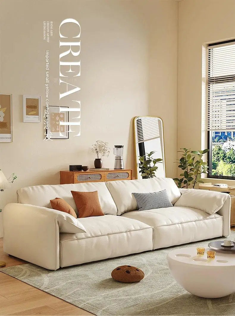 Crafted in genuine Nappa calf leather with a sleek ivory White finish for timeless elegance, a recliner that blends luxury materials with modern comfort WHIMSICAL HOME OF CREATIONS