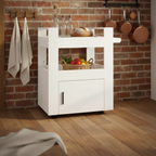 Trolley in cottage kitchen with brick wall